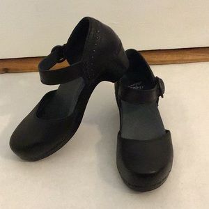 Dansko dress shoe with open sides and closed toe